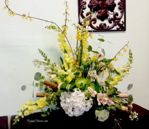 Forsythia branches help create lines for your arrangements